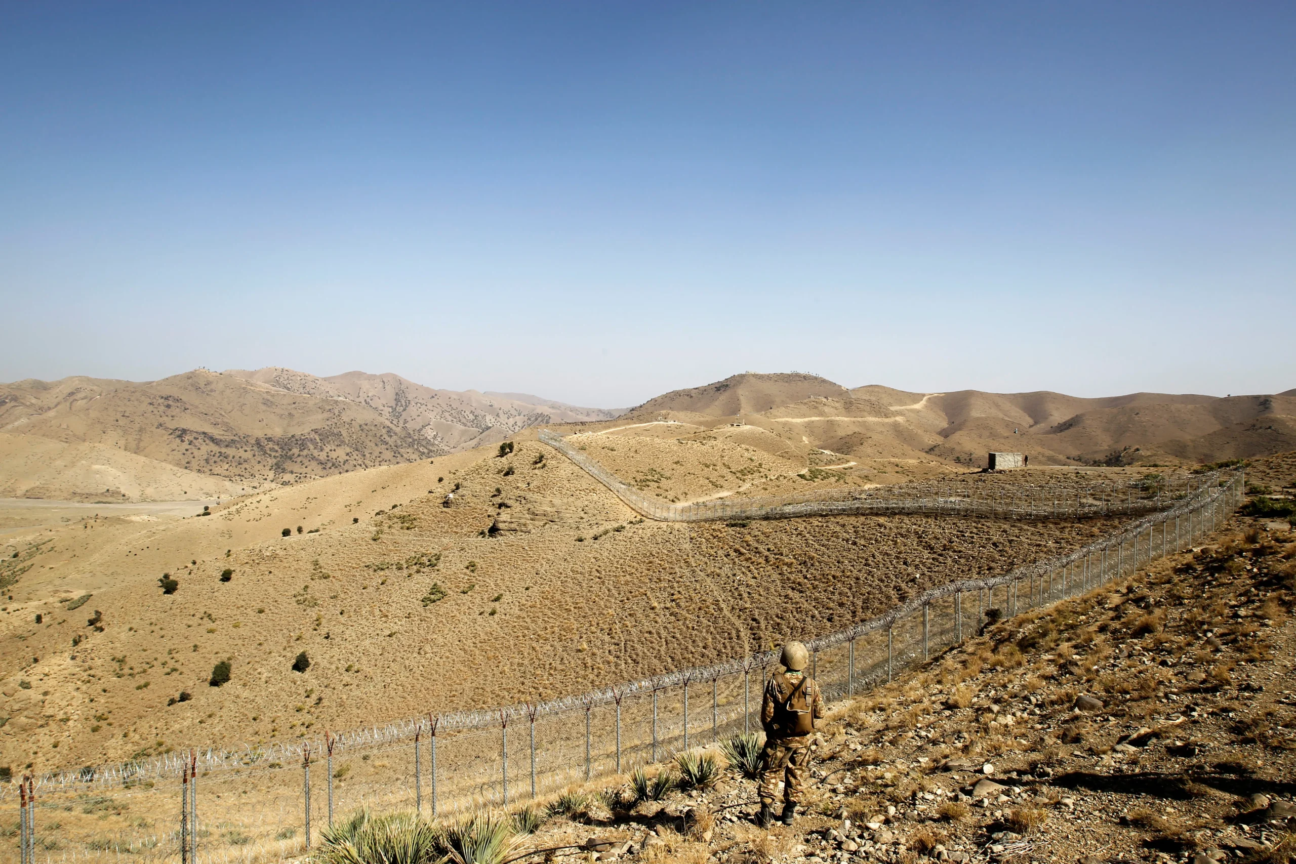 Security personnel on duty at a border post, along the Pakistan-Afghanistan border. [IC: Reuters].