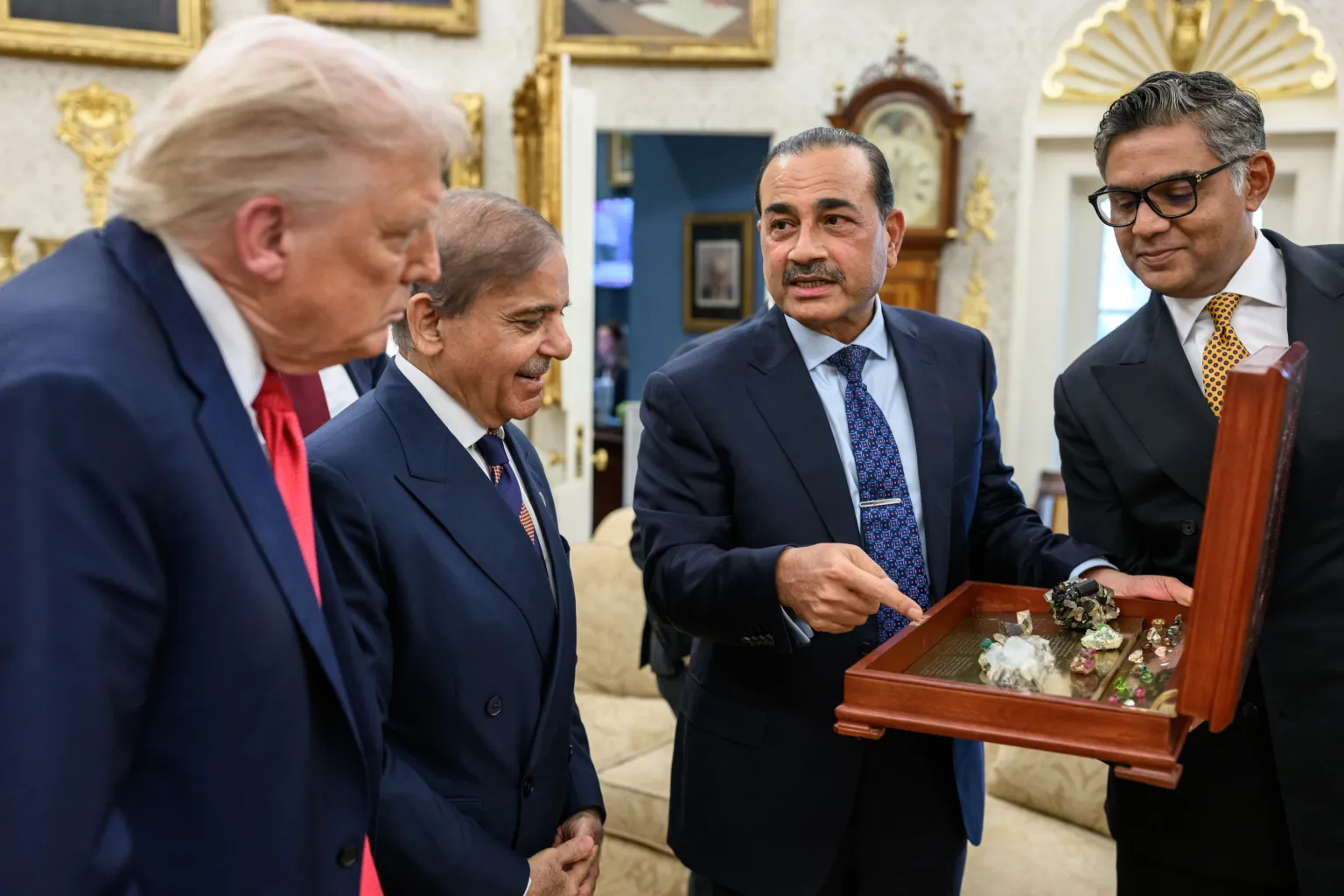 Photograph of Gen. Asim Munir and PM Shehbaz Sharif with U.S. President Donald Trump, displaying gemstones miscast online as rare earths. [Courtesy: White House].