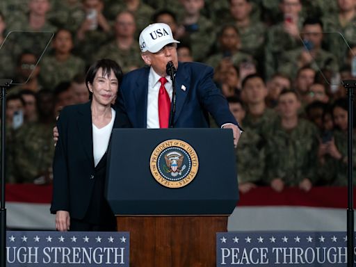 A U.S. Department of State poster showing an American official shaking hands with a Japanese official in front of U.S. and Japanese flags, with the caption “A New Golden Age for the US-Japan Alliance.