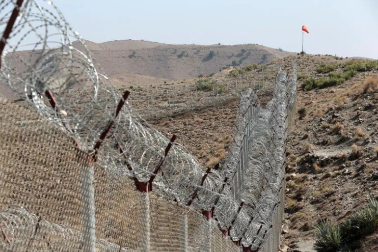 A view of the border fence outside the Kitton outpost on the border with Afghanistan in North Waziristan, Pakistan October 18, 2017 [Caren Firouz/Reuters]