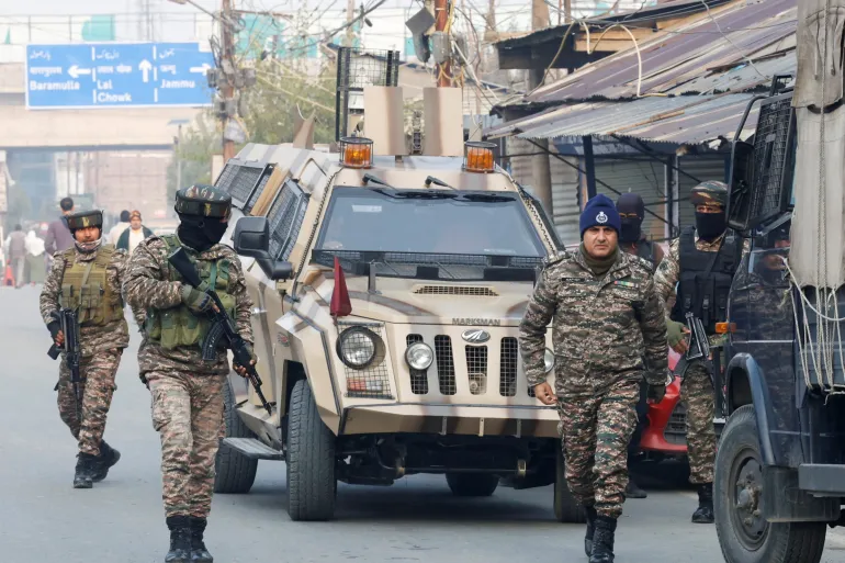 Indian security forces arrive near the site of an explosion in a police station in Srinagar, Indian-Illegally administered Kashmir, on Saturday