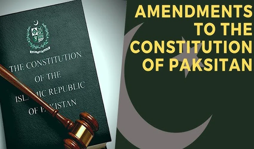 A gavel placed on top of the Constitution of the Islamic Republic of Pakistan, next to a graphic reading 'Amendments to the Constitution of Pakistan,' symbolizing legal changes and constitutional amendments in the country