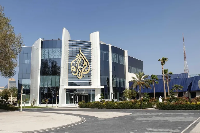 The Al Jazeera Media Network logo is seen on its headquarters building in Doha, Qatar [IC: Showkat Shafi/Al Jazeera]