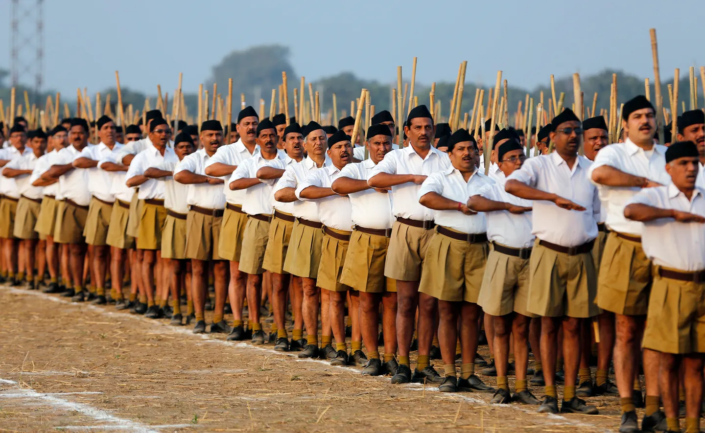 Volunteers of India's Hindu nationalist body RSS take part in a drill in the western Indian city of Ahmedabad on January 3, 2015.