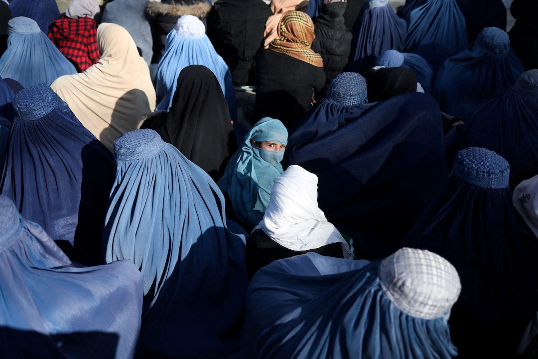 Afghan Women’s Rights Activists Burn Burqas in Herat to Protest Taliban’s Mandatory Veil Order