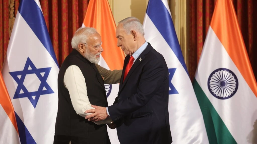 Modi shaking hands with Israeli officials