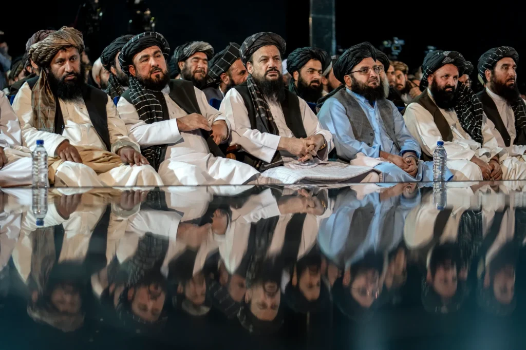 Taliban leadership meeting analysis report graphic showing security concerns and alleged links to past militant activity.