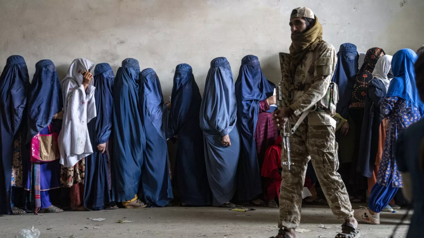 Taliban governance and rights restrictions in Afghanistan highlighted amid reports of deepening humanitarian crisis.